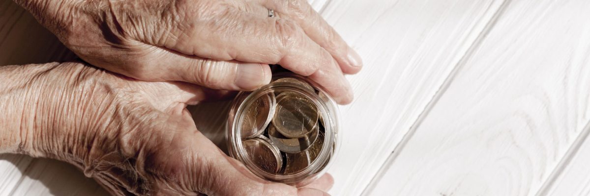 hands-holding-jar-coins